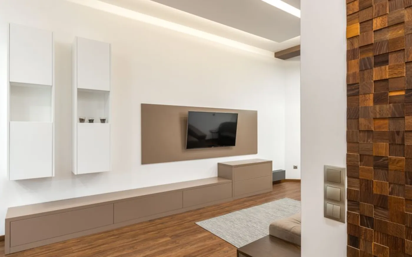 Modern OLED TV being tested onsite with a remote